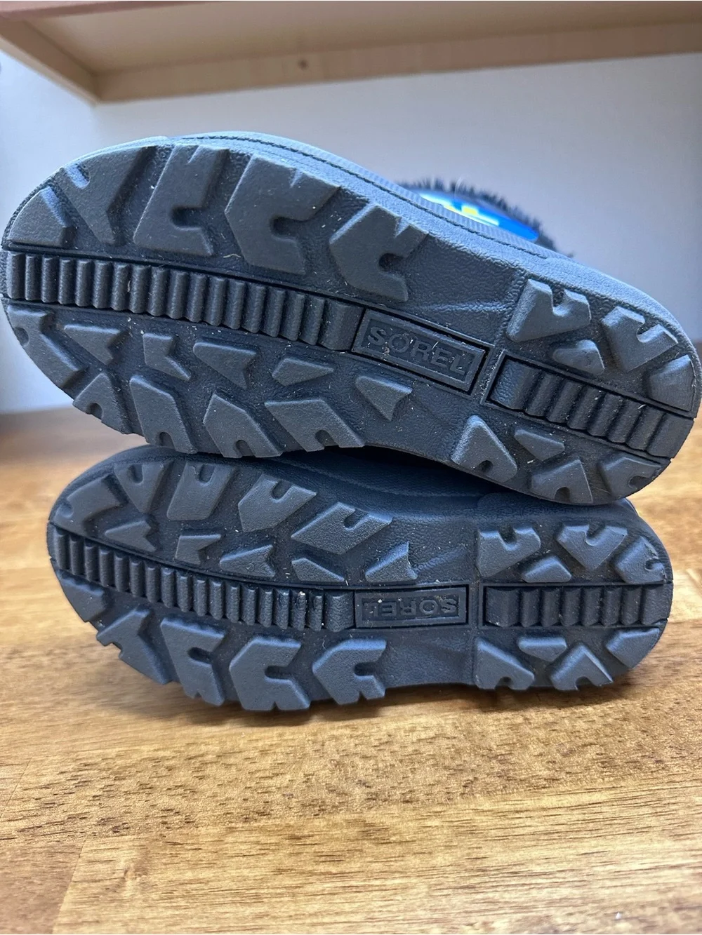 Sorel Kids Black and Blue Winter Boots with Yellow Logo